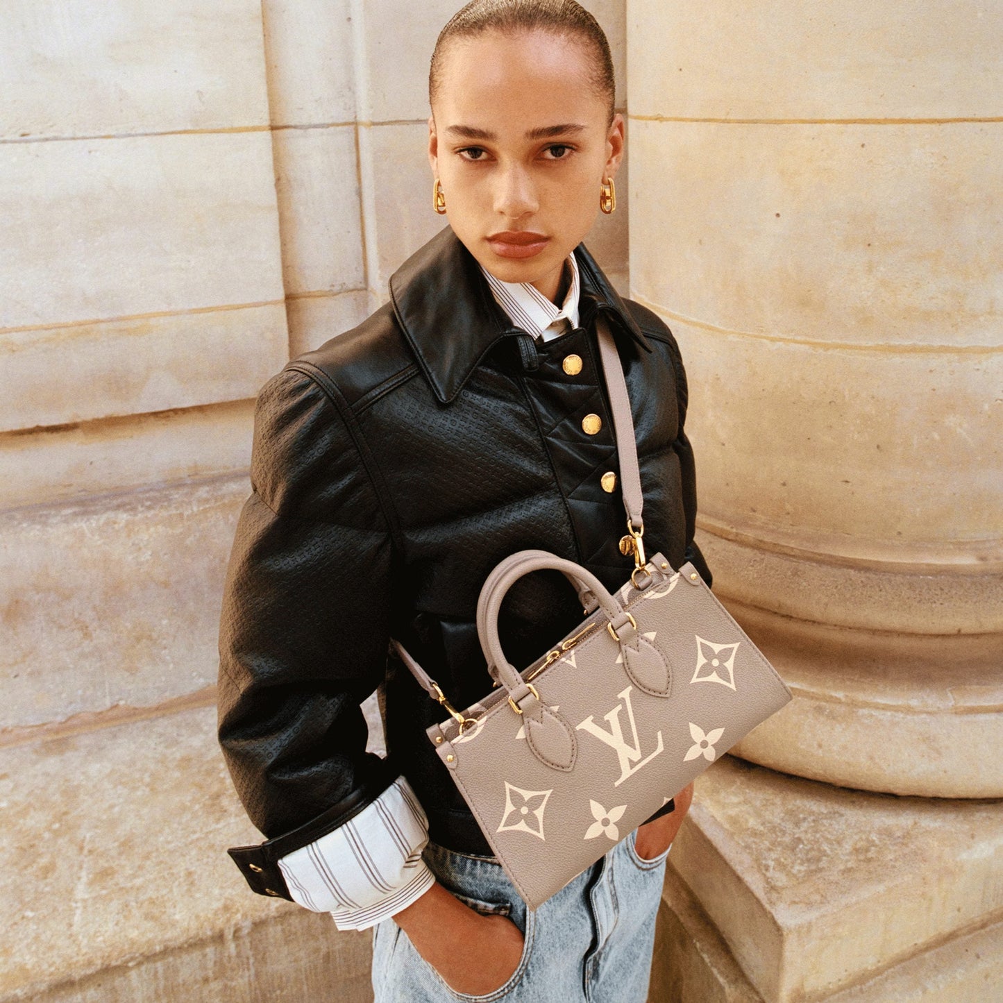 M23641 OnTheGo East West Dove/Cream Bicolor Monogram Empreinte Leather