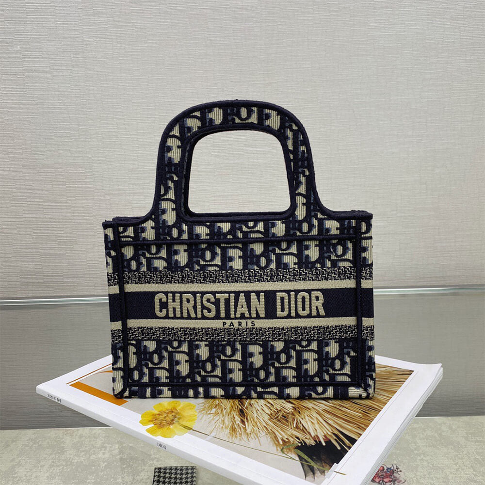 Compact Monogram Bag